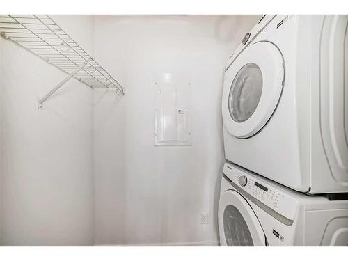 2210-55 Lucas Way Nw, Calgary, AB - Indoor Photo Showing Laundry Room