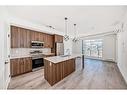 2210-55 Lucas Way Nw, Calgary, AB  - Indoor Photo Showing Kitchen With Stainless Steel Kitchen With Upgraded Kitchen 