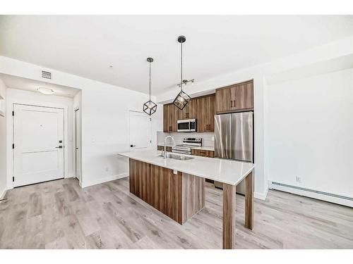 2210-55 Lucas Way Nw, Calgary, AB - Indoor Photo Showing Kitchen With Stainless Steel Kitchen