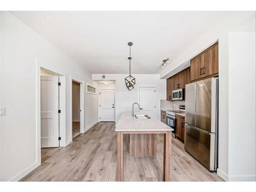 2210-55 Lucas Way Nw, Calgary, AB - Indoor Photo Showing Kitchen With Stainless Steel Kitchen