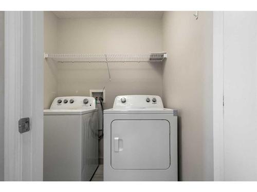 220 Covebrook Close Ne, Calgary, AB - Indoor Photo Showing Laundry Room