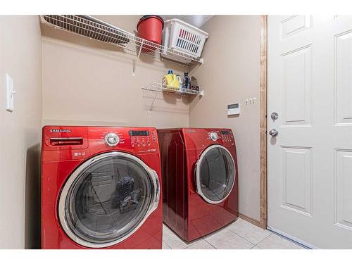 115 Panamount Heights Nw, Calgary, AB - Indoor Photo Showing Laundry Room