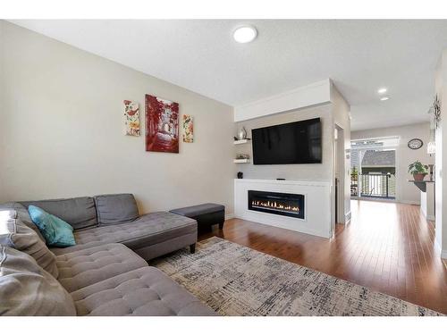 88 Redstone Avenue Ne, Calgary, AB - Indoor Photo Showing Living Room With Fireplace