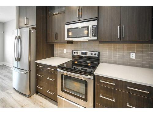 1104 17 Avenue Nw, Calgary, AB - Indoor Photo Showing Kitchen With Stainless Steel Kitchen