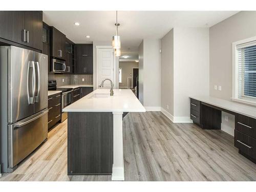 1104 17 Avenue Nw, Calgary, AB - Indoor Photo Showing Kitchen With Stainless Steel Kitchen With Upgraded Kitchen