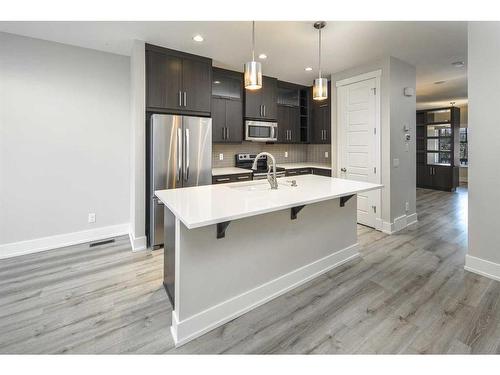 1104 17 Avenue Nw, Calgary, AB - Indoor Photo Showing Kitchen With Stainless Steel Kitchen With Upgraded Kitchen