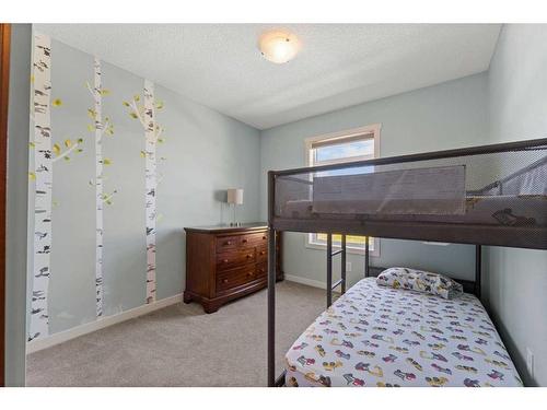 57 Copperpond Landing Se, Calgary, AB - Indoor Photo Showing Bedroom