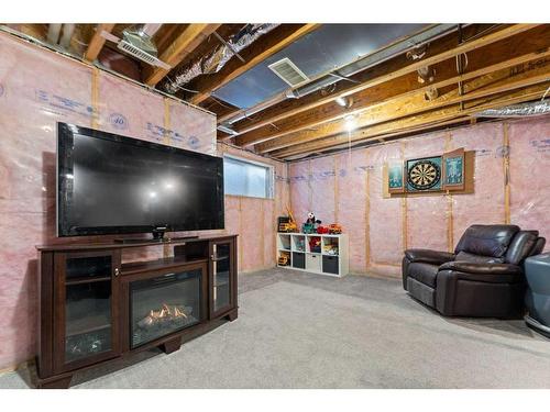 57 Copperpond Landing Se, Calgary, AB - Indoor Photo Showing Basement