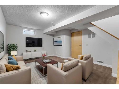 120 Martinbrook Road Ne, Calgary, AB - Indoor Photo Showing Living Room