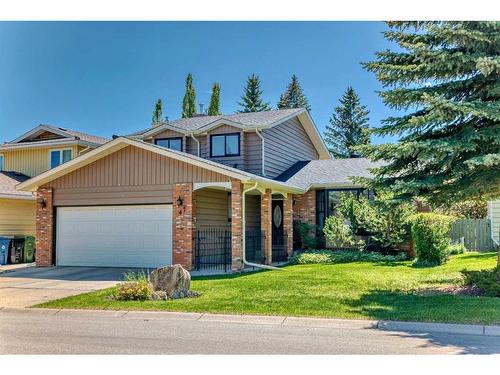 47 Woodmont Drive Sw, Calgary, AB - Outdoor With Facade