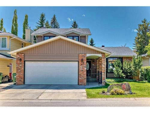 47 Woodmont Drive Sw, Calgary, AB - Outdoor With Facade