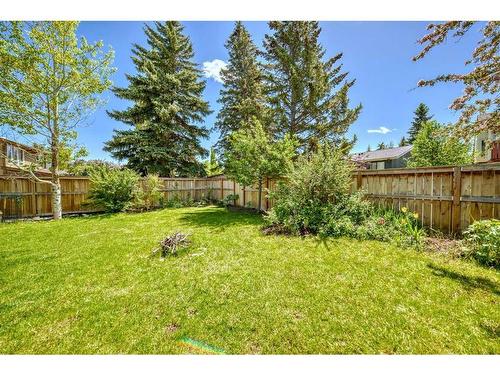 47 Woodmont Drive Sw, Calgary, AB - Outdoor With Backyard