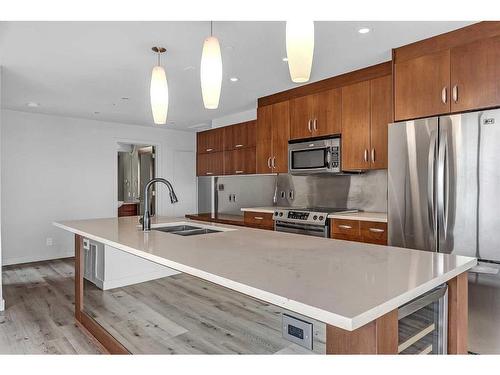 1801-530 12 Avenue Sw, Calgary, AB - Indoor Photo Showing Kitchen With Stainless Steel Kitchen With Double Sink With Upgraded Kitchen