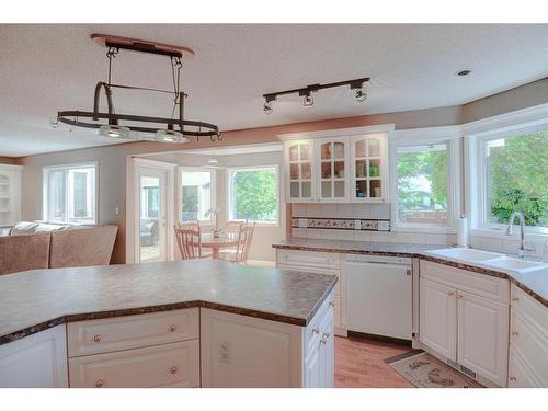 10827 Valley Springs Road Nw, Calgary, AB - Indoor Photo Showing Kitchen With Double Sink