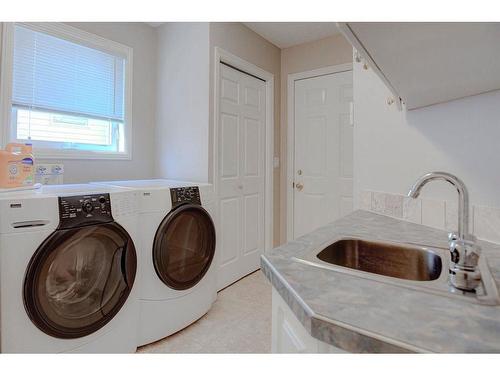10827 Valley Springs Road Nw, Calgary, AB - Indoor Photo Showing Laundry Room