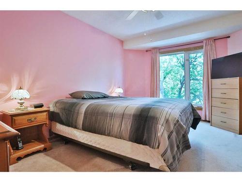 57 Macewan Ridge Circle Nw, Calgary, AB - Indoor Photo Showing Bedroom