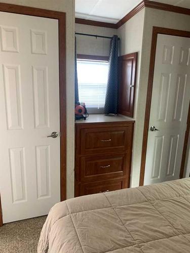155 Cormorant Crescent, Rural Vulcan County, AB - Indoor Photo Showing Bedroom