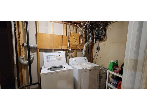 908 Hunterston Road Nw, Calgary, AB - Indoor Photo Showing Laundry Room