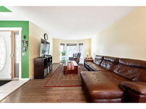 55 Downey Road, Okotoks, AB - Indoor Photo Showing Living Room