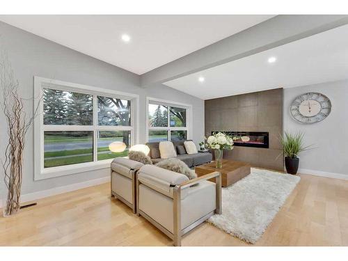 1525 Northmount Drive Nw, Calgary, AB - Indoor Photo Showing Living Room With Fireplace