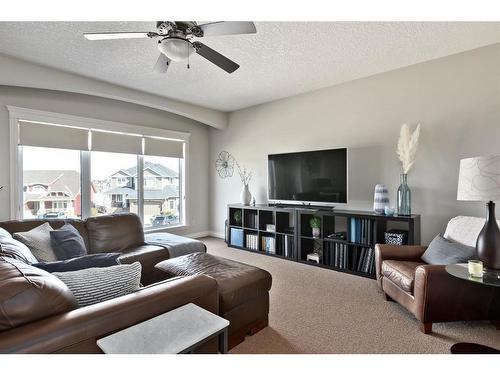 19 Auburn Sound Cove Se, Calgary, AB - Indoor Photo Showing Living Room