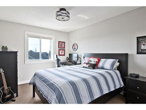 19 Auburn Sound Cove Se, Calgary, AB - Indoor Photo Showing Bedroom