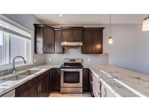 1055 Cornerstone Street Ne, Calgary, AB - Indoor Photo Showing Kitchen With Double Sink With Upgraded Kitchen
