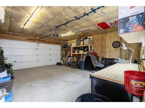 104 Legacy View Se, Calgary, AB - Indoor Photo Showing Garage