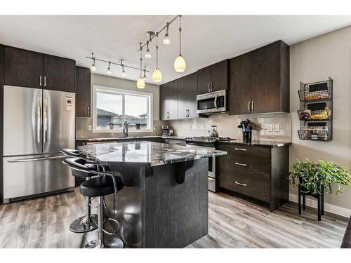 104 Legacy View Se, Calgary, AB - Indoor Photo Showing Kitchen With Stainless Steel Kitchen With Upgraded Kitchen