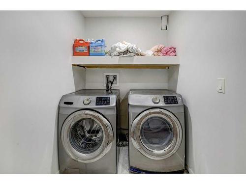 164 Livingston Parade Ne, Calgary, AB - Indoor Photo Showing Laundry Room