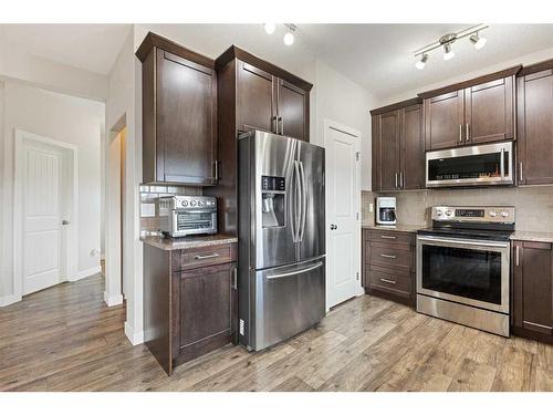 2 Valarosa Court, Didsbury, AB - Indoor Photo Showing Kitchen With Stainless Steel Kitchen