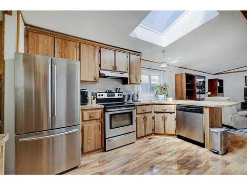134 Erin Woods Circle Se, Calgary, AB - Indoor Photo Showing Kitchen With Stainless Steel Kitchen
