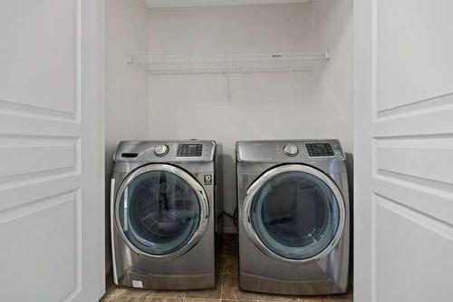 968 Taradale Drive Ne, Calgary, AB - Indoor Photo Showing Laundry Room