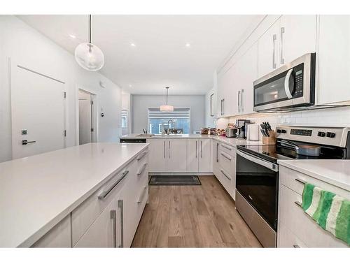 66 Mallard Heath Se, Calgary, AB - Indoor Photo Showing Kitchen With Stainless Steel Kitchen With Upgraded Kitchen