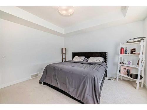 66 Mallard Heath Se, Calgary, AB - Indoor Photo Showing Bedroom