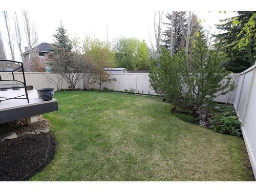 132 Evergreen Heights Sw, Calgary, AB - Outdoor With Backyard