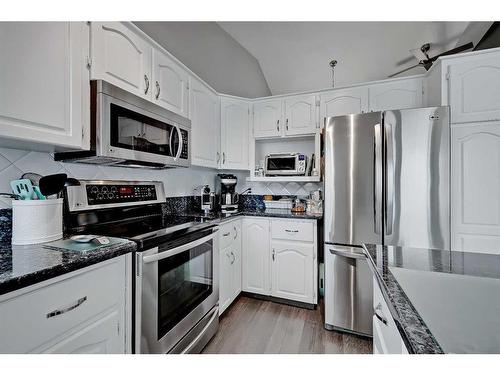 136 Hawkdale Close Nw, Calgary, AB - Indoor Photo Showing Kitchen With Stainless Steel Kitchen
