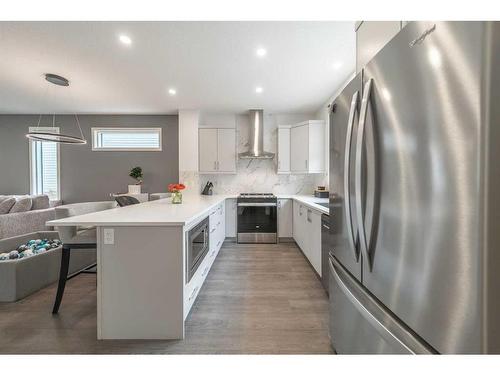 213 Wolf Willow Boulevard Se, Calgary, AB - Indoor Photo Showing Kitchen With Stainless Steel Kitchen With Upgraded Kitchen