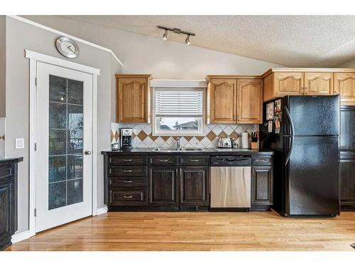367 Hidden Vale Place Nw, Calgary, AB - Indoor Photo Showing Kitchen With Double Sink