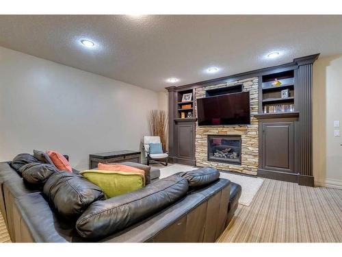 15 Crestridge Point Sw, Calgary, AB - Indoor With Fireplace