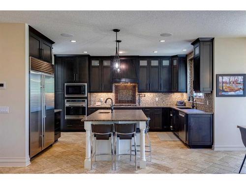 15 Crestridge Point Sw, Calgary, AB - Indoor Photo Showing Kitchen With Stainless Steel Kitchen With Upgraded Kitchen