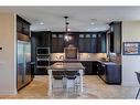 15 Crestridge Point Sw, Calgary, AB  - Indoor Photo Showing Kitchen With Stainless Steel Kitchen With Upgraded Kitchen 