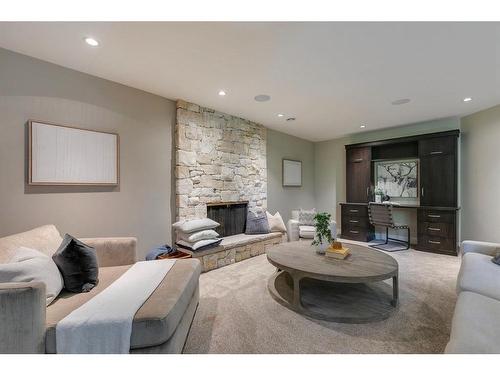 626 Riverdale Avenue Sw, Calgary, AB - Indoor Photo Showing Living Room With Fireplace