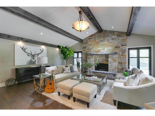 626 Riverdale Avenue Sw, Calgary, AB - Indoor Photo Showing Living Room With Fireplace