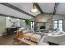 626 Riverdale Avenue Sw, Calgary, AB  - Indoor Photo Showing Living Room With Fireplace 