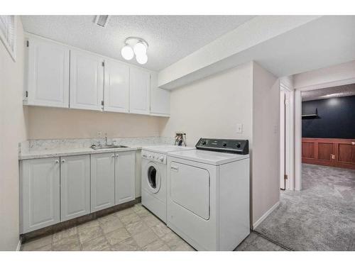 7319 37 Avenue Nw, Calgary, AB - Indoor Photo Showing Laundry Room