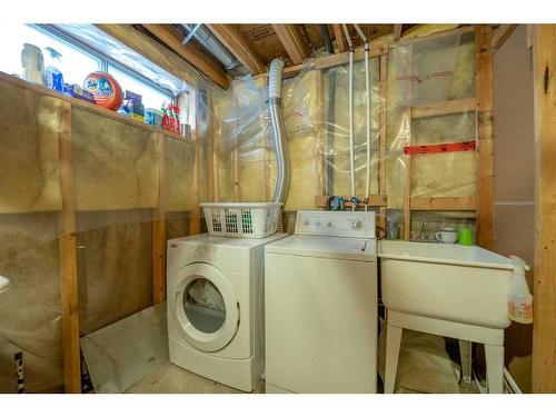 284 Mt Aberdeen Close Se, Calgary, AB - Indoor Photo Showing Laundry Room