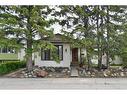 10820 7 Street Sw, Calgary, AB  - Outdoor With Facade 