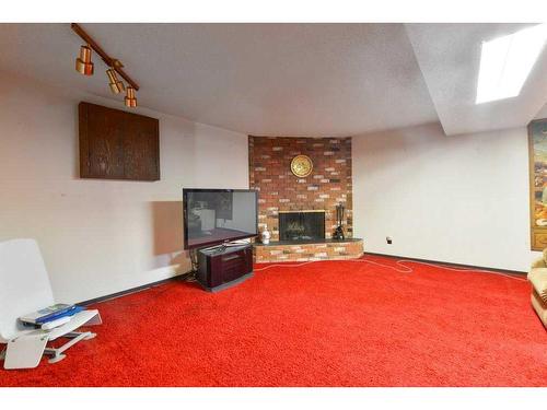 10820 7 Street Sw, Calgary, AB - Indoor With Fireplace