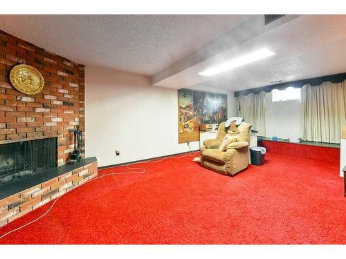 10820 7 Street Sw, Calgary, AB - Indoor With Fireplace